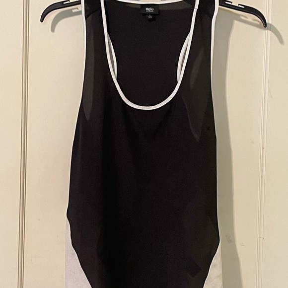 Mossimo Supply Co. Tops - Black and white tank.  Sheer. Size large. Great condition.